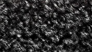 les arrière-plans de texture de pierre noire sont utilisés pour l'imagerie graphique par ordinateur, la conception graphique, le papier peint, le cuir, la moquette et à de nombreuses fins. photo
