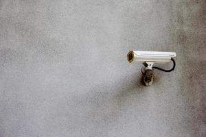 caméra de vidéosurveillance de sécurité sur le mur photo