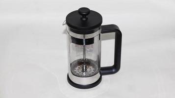 Close-up of coffee press maker - French press coffee maker photo