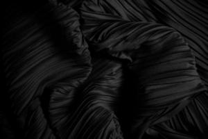 élégante texture abstraite en tissu noir adaptée à la décoration encadrée photo