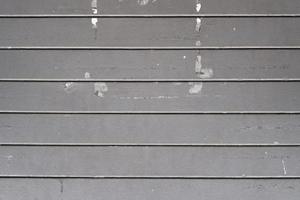 motif de lignes horizontales, arrière-plan, gros plan de la texture du mur de la planche de bois, mur rayé vintage gris. photo