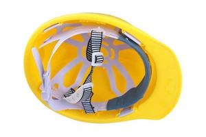 Casque de sécurité jaune sur fond blanc photo