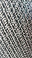 photo en gros plan d'un matériau en fil d'acier, treillis métallique.