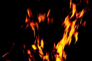 texture de flamme de feu. toile de fond matérielle brûlante. motif à effet de brûlure. fond d'écran de flammes et de torches. toile de fond de chaleur et de brume. photo