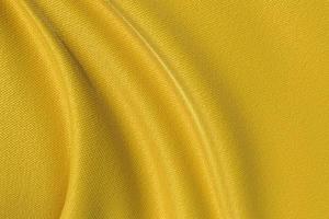 fond de texture de tissu jaune photo