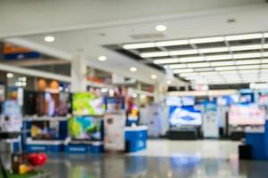 Grand magasin électronique avec arrière-plan flou bokeh photo