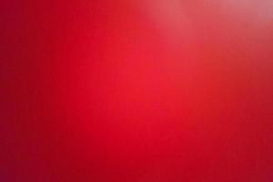 arrière-plan de tournage en cuir rouge flou et granuleux par caméra mobile. photo
