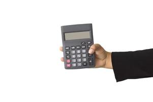 Close up business woman's hand holding calculatrice sur un fond blanc photo