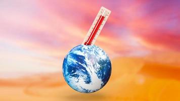 le thermomètre et la terre pour l'éco ou le concept de changement climatique rendu 3d photo