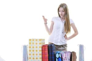 Happy young adult women shopping avec des sacs colorés photo