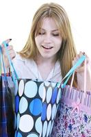 Happy young adult women shopping avec des sacs colorés photo