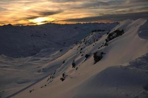 coucher de soleil neige montagne photo