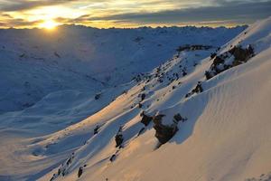 coucher de soleil neige montagne photo