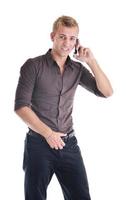 un homme d'affaires avec téléphone portable isolé sur blanc photo