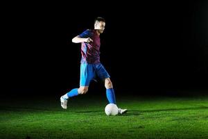 joueur de football en action photo