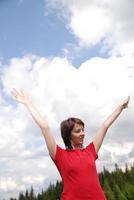 femme contre le ciel photo