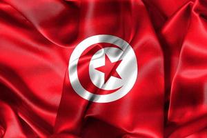 Illustration 3d d'un drapeau tunisien - drapeau en tissu ondulant réaliste photo