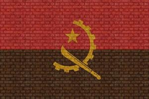 drapeau 3d de l'angola sur le mur de briques photo