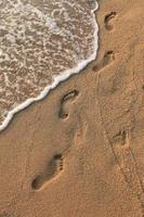 traces de pas dans le sable