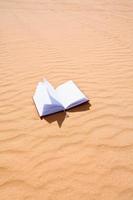 carnet de notes sur la dune de sable photo