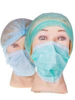 têtes de médecin factices portant une casquette et un masque chirurgicaux en textile photo