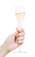 la main tient un verre de flûte avec du champagne photo