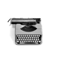 Vieille machine à écrire isolé sur fond blanc photo
