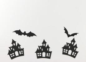 décorations pour les vacances d'halloween, châteaux et chauves-souris sur fond blanc. photo