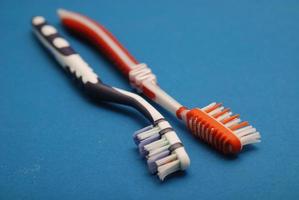 brosse à dents sur bleu photo