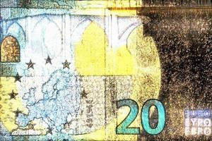 illustration de billets en euros brillants avec une aura kirlian verte autour d'eux. photo