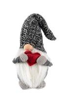 Jouet elf fait main habillé en bonnet tricoté avec boîte-cadeau isolé sur fond blanc photo