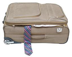 valise textile avec cravate tombée isolée photo