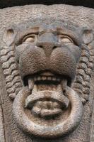 élément décoratif ancien bâtiment en forme de tête de lion