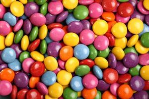 bonbons colorés en forme de bouton remplis de chocolat photo