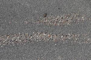 vue détaillée sur les surfaces d'asphalte de différentes rues et routes avec des fissures photo