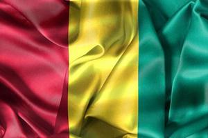 drapeau de la guinée - drapeau en tissu ondulant réaliste photo