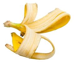 Peau d'une banane jaune isolée sur blanc photo