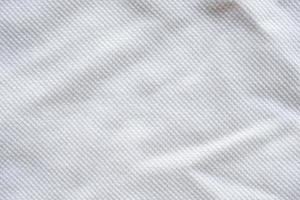 fond de texture de jersey de vêtements de sport en tissu blanc photo