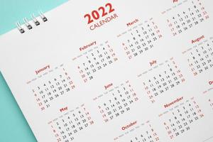 Page de calendrier 2022 sur fond bleu concept de réunion de rendez-vous de planification d'entreprise photo