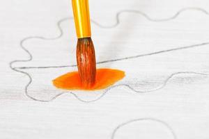 dessin ornement orange sur toile de soie photo