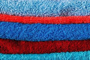 Pile de serviettes de couleur plein cadre close-up background photo