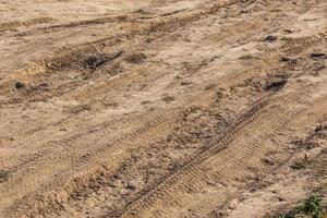 Chemin de terre sec et poussiéreux - gros plan plein cadre photo