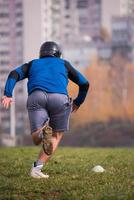 joueur de football américain en action photo