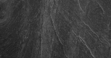 fond naturel de texture de surface en pierre de marbre noir photo