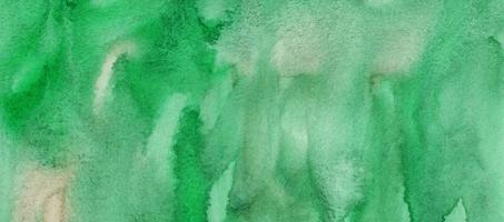 bannière de fond vert aquarelle. toile de fond liquide, peinte à la main. photo