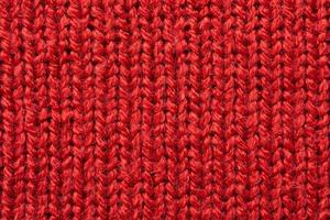 fond de surface de texture de laine de tissu tricoté rouge photo