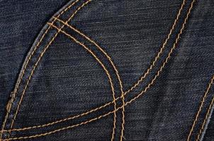 la texture du tissu denim noir photo