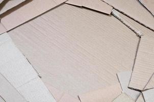 arrière-plan de textures de papier empilé prêt à recycler. un paquet de vieux cartons de bureau pour le recyclage des vieux papiers. tas de vieux papiers photo