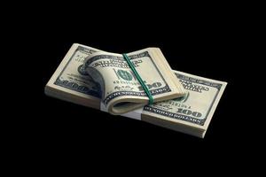 liasse de billets d'un dollar américain isolés sur fond noir. pack d'argent américain avec une haute résolution sur fond noir parfait photo