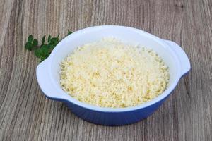 parmesan râpé sur bois photo